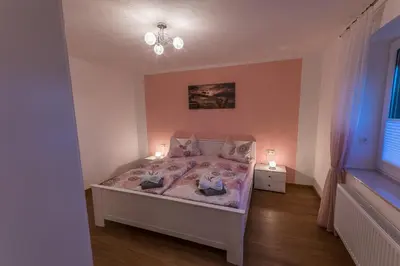 Ein Bett oder Betten in einem Zimmer der Unterkunft Ferienwohnung 