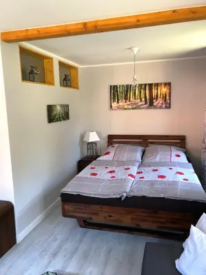 Ein Bett oder Betten in einem Zimmer der Unterkunft Fuchsbau