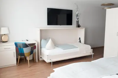Ein Bett oder Betten in einem Zimmer der Unterkunft Altstadt-Apartment