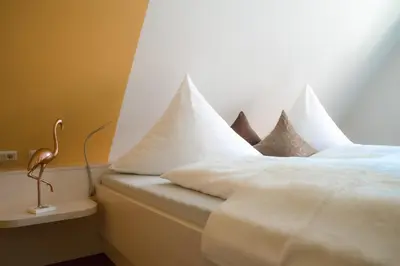 Ein Bett oder Betten in einem Zimmer der Unterkunft Altstadt-Apartment