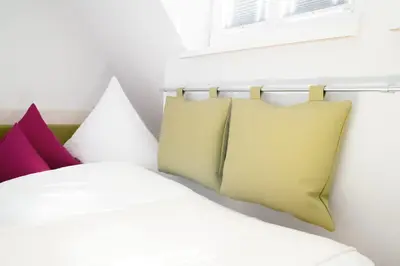 Ein Bett oder Betten in einem Zimmer der Unterkunft Altstadt-Apartment