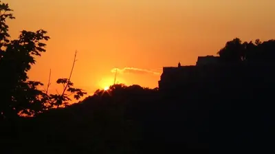 Blick auf den Sonnenuntergang/Sonnenaufgang von der Ferienwohnung aus oder aus der Nähe