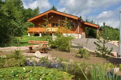 Ein Garten an der Unterkunft Erzgebirgsholzhaus am Lugstein