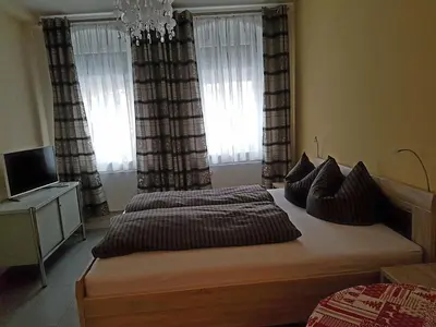 Ein Bett oder Betten in einem Zimmer der Unterkunft Ferienoase