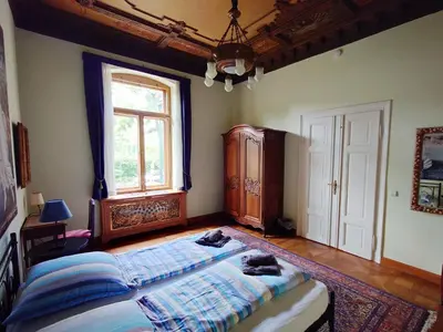Ein Bett oder Betten in einem Zimmer der Unterkunft Ferienwohnung Villa Haniel Edmund