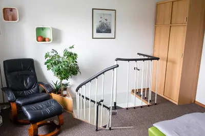 Ein Bett oder Betten in einem Zimmer der Unterkunft Am Zirkelstein 38 b
