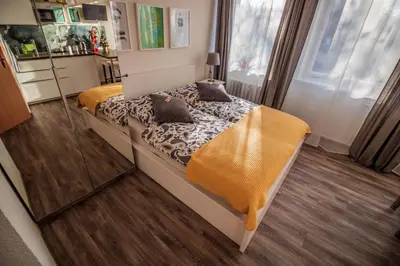 Ein Bett oder Betten in einem Zimmer der Unterkunft GottwaldHaus - Apartment