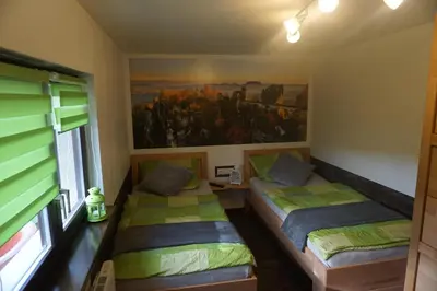 Ein Bett oder Betten in einem Zimmer der Unterkunft FerienhausTeube