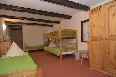 Ein Bett oder Betten in einem Zimmer der Unterkunft Pferdehof Berger