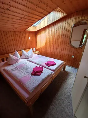 Ein Bett oder Betten in einem Zimmer der Unterkunft Ferienhaus Hering