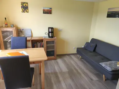 Ein Sitzbereich in der Unterkunft Ferienhaus Hering