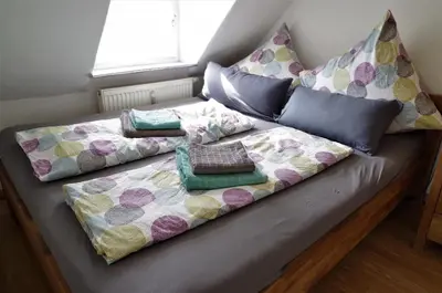 Ein Bett oder Betten in einem Zimmer der Unterkunft Meissen Apartments - moderne Ferienwohnungen in Meißen am Lutherplatz