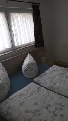 Ein Bett oder Betten in einem Zimmer der Unterkunft Ferienhaus Schrammsteinblick