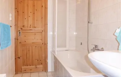 Ein Badezimmer in der Unterkunft Cozy Apartment In Gelenau With Wifi
