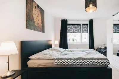Ein Bett oder Betten in einem Zimmer der Unterkunft Schlummi gemütliche zentrale & saubere Wohnung