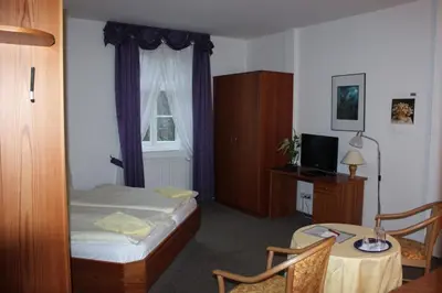 Ein Bett oder Betten in einem Zimmer der Unterkunft Landgasthof Neue Schänke