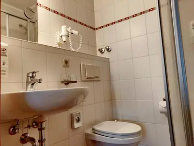 Ein Badezimmer in der Unterkunft Hotel Neue Höhe
