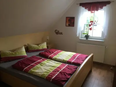 Ein Bett oder Betten in einem Zimmer der Unterkunft Fewo Ehrlich Sächs. Schweiz