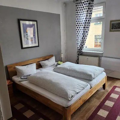 Ein Bett oder Betten in einem Zimmer der Unterkunft Pension Olé