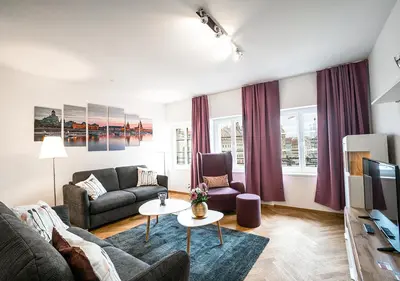 Ein Sitzbereich in der Unterkunft Aparthotel Am Schloss