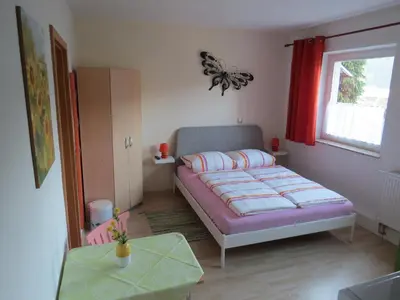 Ein Bett oder Betten in einem Zimmer der Unterkunft Ferienwohnung Morgensonne