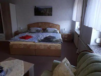 Ein Bett oder Betten in einem Zimmer der Unterkunft Ferienhaus Luise