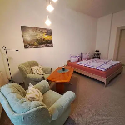 Ein Bett oder Betten in einem Zimmer der Unterkunft Ferienwohnung Hahn