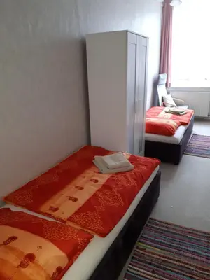 Ein Bett oder Betten in einem Zimmer der Unterkunft Ferienwohnung Hahn