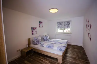 Ein Bett oder Betten in einem Zimmer der Unterkunft Ferienwohnung an der Habe