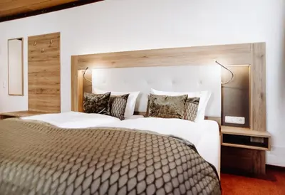 Ein Bett oder Betten in einem Zimmer der Unterkunft Hotel Frauensteiner Hof