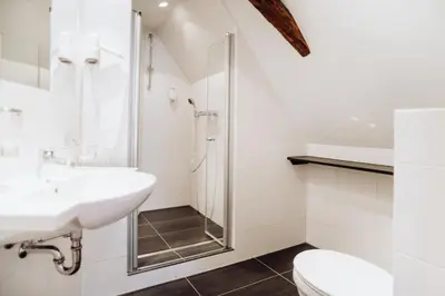 Ein Badezimmer in der Unterkunft Hotel Frauensteiner Hof