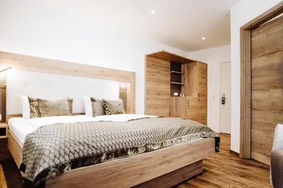 Ein Bett oder Betten in einem Zimmer der Unterkunft Hotel Frauensteiner Hof