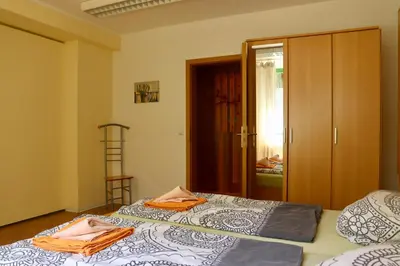 Ein Bett oder Betten in einem Zimmer der Unterkunft Ferienwohnungen am Großen Garten