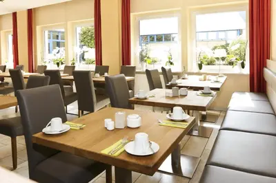 Ein Sitzbereich in der Unterkunft Hotel garni Grundmühle