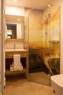 Ein Badezimmer in der Unterkunft Hotel garni Grundmühle