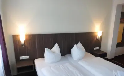 Ein Bett oder Betten in einem Zimmer der Unterkunft Pension Luft