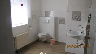 Ein Badezimmer in der Unterkunft Ferienzimmer Haus Läsker