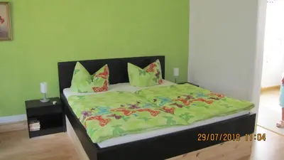 Ein Bett oder Betten in einem Zimmer der Unterkunft Ferienzimmer Haus Läsker