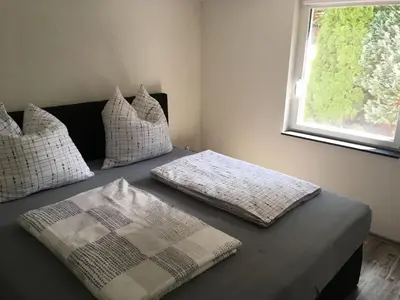 Ein Bett oder Betten in einem Zimmer der Unterkunft Ferienhaus Seenland