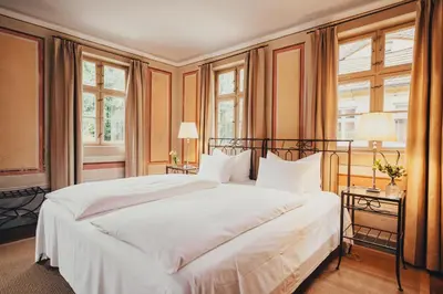 Ein Bett oder Betten in einem Zimmer der Unterkunft Villa Sorgenfrei und Restaurant Atelier Sanssouci