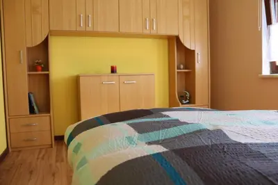 Ein Bett oder Betten in einem Zimmer der Unterkunft Ferienwohnung Gläser