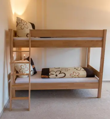 Ein Bett oder Betten in einem Zimmer der Unterkunft Ferienhof Höhensonne
