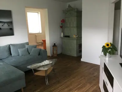 Ein Sitzbereich in der Unterkunft Ferienwohnung zum Rabenauer Grund