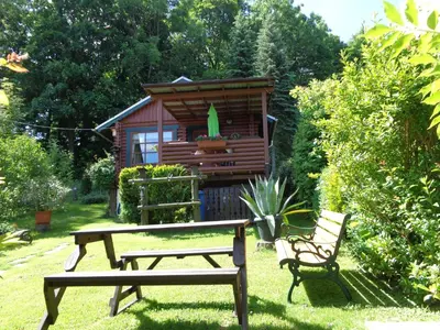 Ein Garten an der Unterkunft Ferienhaus Sachse