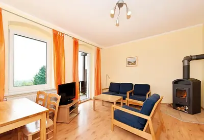 Ein Sitzbereich in der Unterkunft Panorama-Apartments Weinberghaus