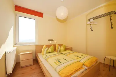 Ein Bett oder Betten in einem Zimmer der Unterkunft Panorama-Apartments Weinberghaus