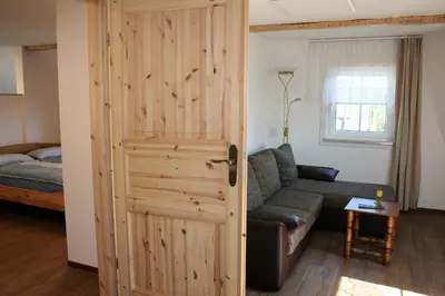Ein Bett oder Betten in einem Zimmer der Unterkunft Zum-Seiffener-Sprengmeister