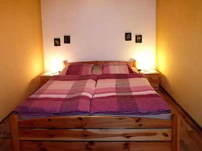 Ein Bett oder Betten in einem Zimmer der Unterkunft Ferienwohnungen Schrot