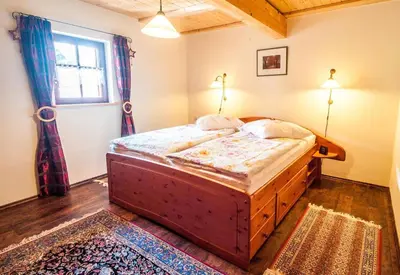 Ein Bett oder Betten in einem Zimmer der Unterkunft Auszeithof Niederfrohna