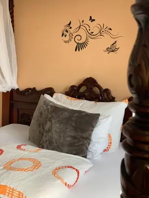 Ein Bett oder Betten in einem Zimmer der Unterkunft Hotel Bannewitz B&B